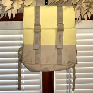 Rains Yellow and Tan Backpack